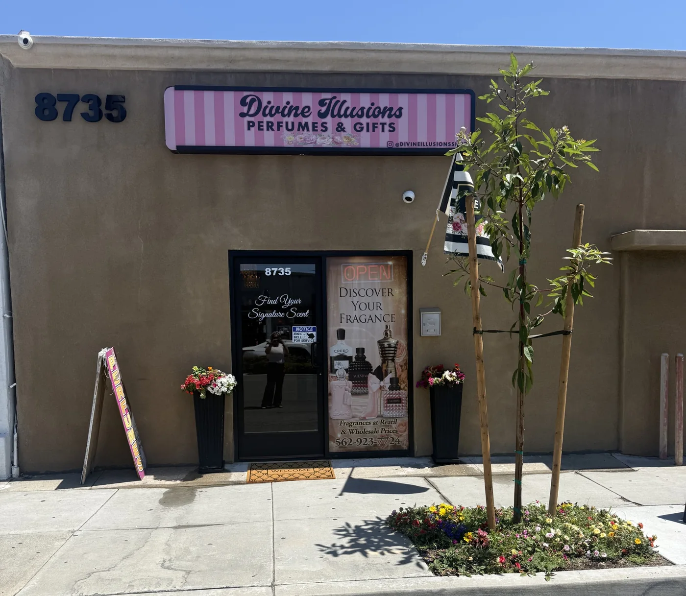 The Divine Illusions Perfumes & Gifts storefront on Firestone Blvd in Downey
